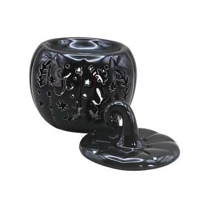 black pumpkin on white background