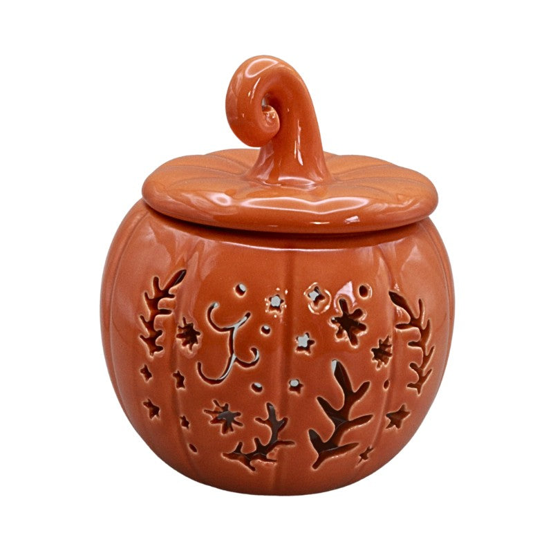 orange ceramic pumpkin on a white background