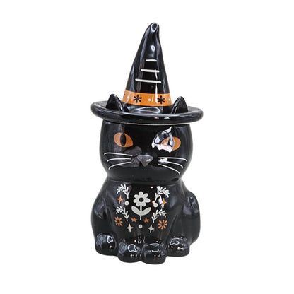 black and orange cat oil burner with folk art floral design, on a white background