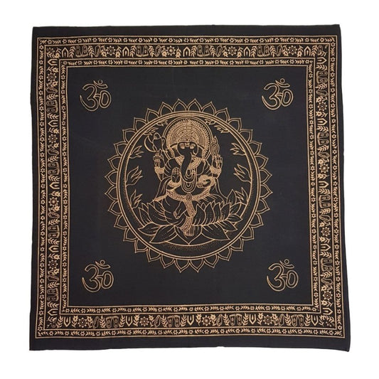 Black fabric with gold ganesh image   and Om symbols on a white background