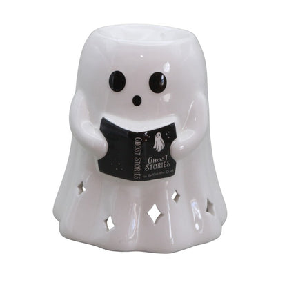 White ghost-shaped oil burner with a book titled 'Ghost Stories' on a white background