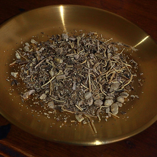Dry gravel root  on a brass plate