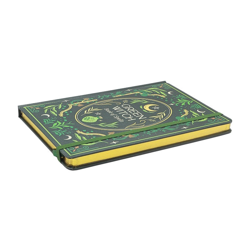 Green notebook with decorative cover on a white background