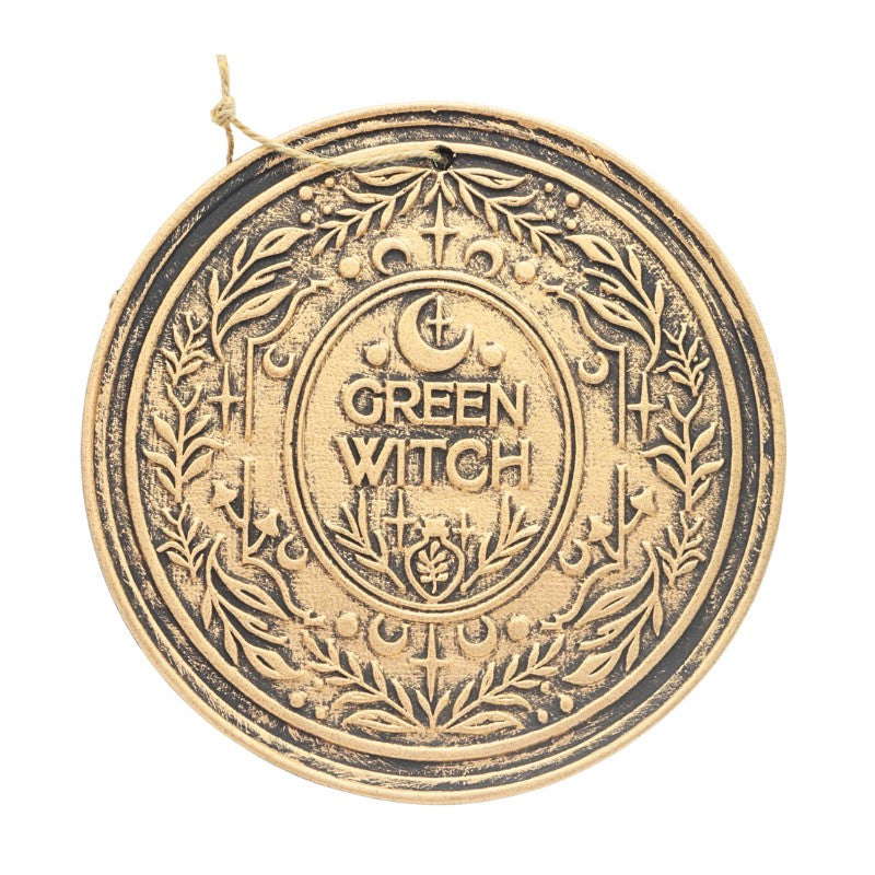 Decorative wall hanging sign with 'Green Witch' text on a white background
