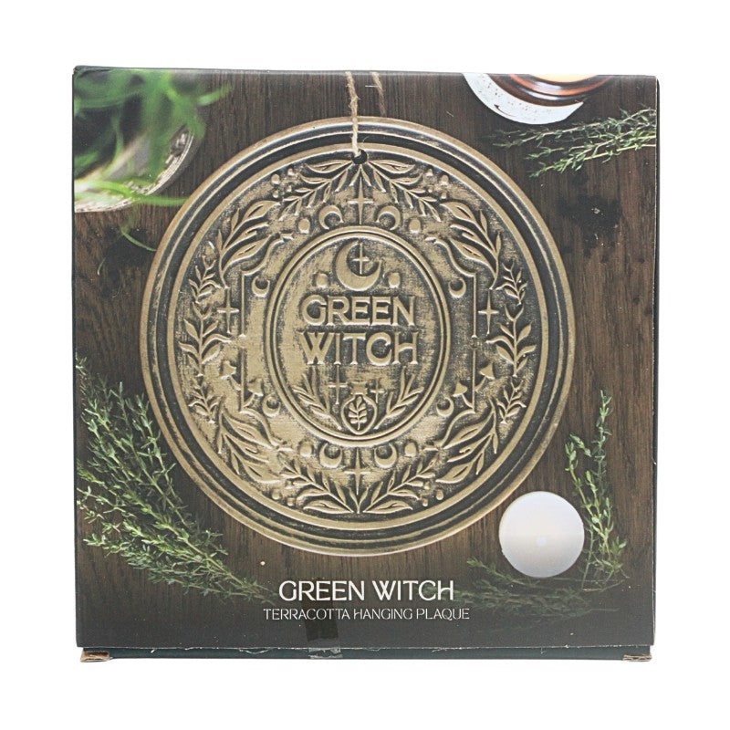 Box for a 'Green Witch' terracotta hanging plaque with decorative design.