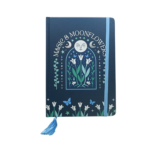 blue notebook with a floral moon design and title "magic & moonflowers"