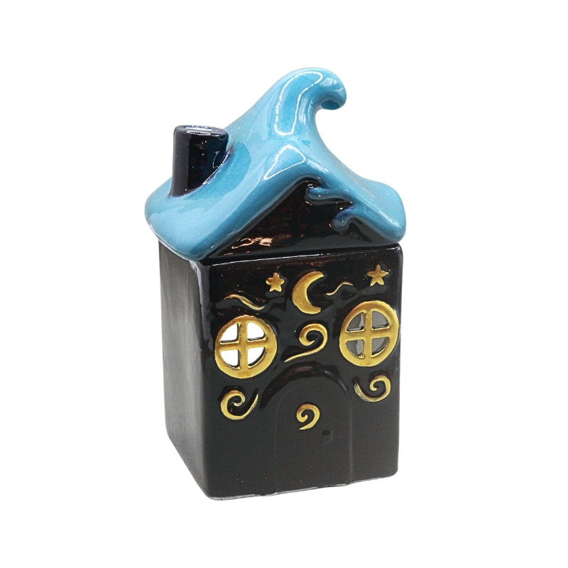 A small decorative ceramic house-shaped item with a glossy  dark blue  body, a light blue roof, and gold celestial details including stars, a crescent moon, and swirls, shown on a plain white background.