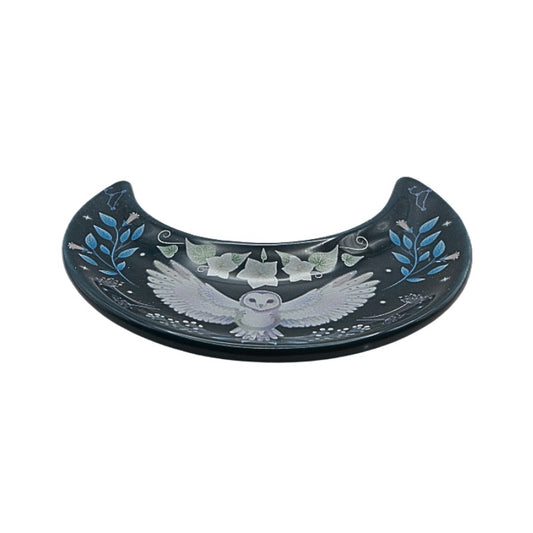 Decorative plate with an owl design on a white background