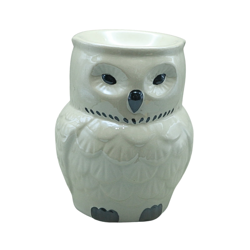 white ceramic oil burner in the shape of an owl on a white background