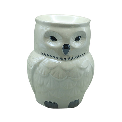 white ceramic oil burner in the shape of an owl on a white background