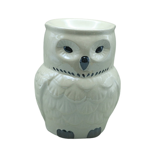 white ceramic oil burner in the shape of an owl on a white background