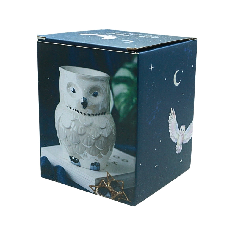 blue packaging box showing a white ceramic oil burner in the shape of an owl