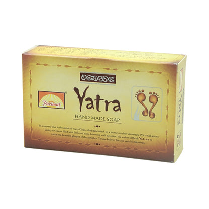 Gold Parimal Yatra handmade soap box with brown lettering and a footprint design on a white background