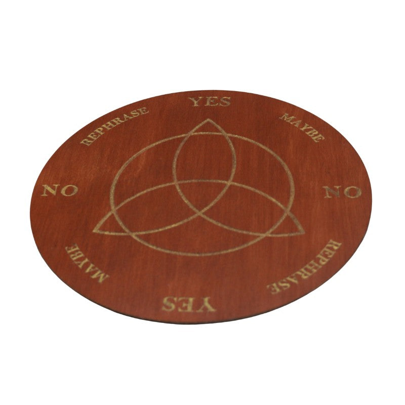 Wooden disc with a Trinity knot symbol and yes/no text on a white background