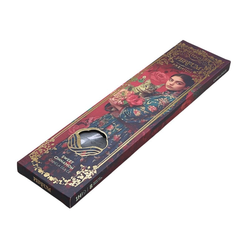 Perfume incense box with floral design and face on a white background