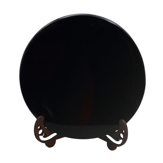black obsidian scrying mirror on stand