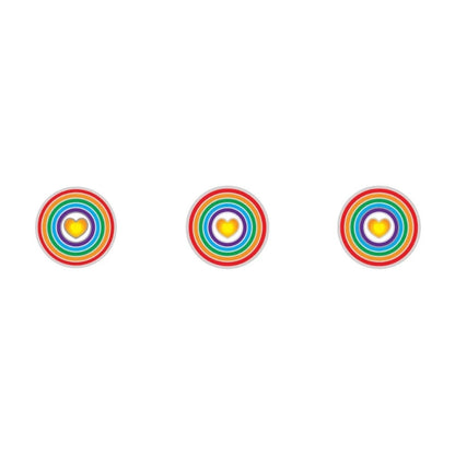 Three rainbow circular stickers with heart centers on a white background