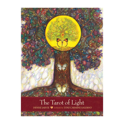 The Tarot of Light art card deck box cover featuring a stained-glass style tree of life with a glowing yellow sun and butterflies, with the title at the bottom.