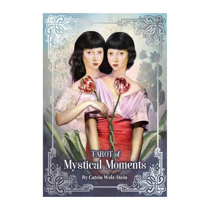 TAROT of Mystical Moments card deck box cover by Catrin Welz-Stein, featuring a vintage-style illustration of two women holding red flowers, framed by ornate silver corner details.
