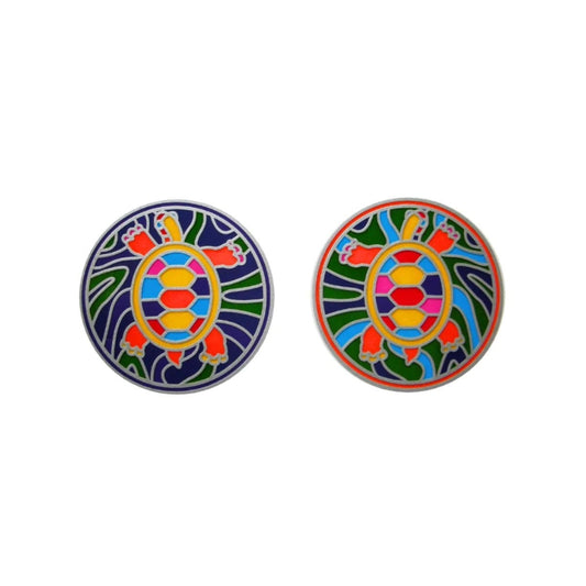 Two round stickers featuring a colourful turtle design on a white background.
