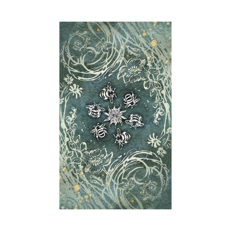 back of verdance tarot card showing  bee and floral pattern on a blue background