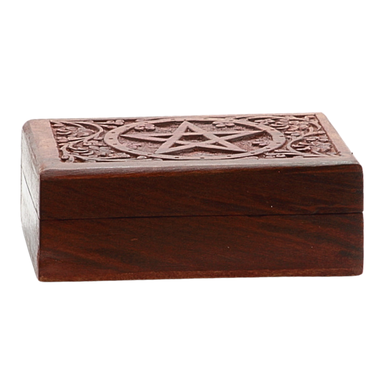 carved wooden box with pentacle design on top