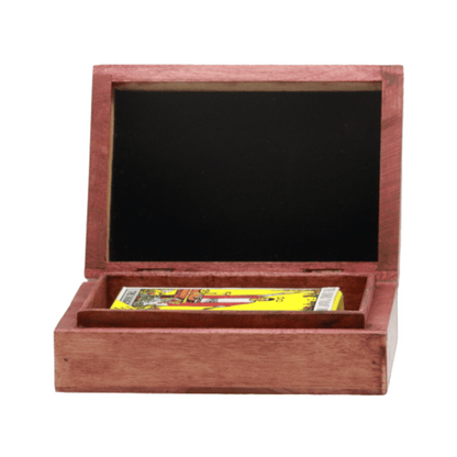 carved wooden box with a pack of standard size rider waite tarot cards in it