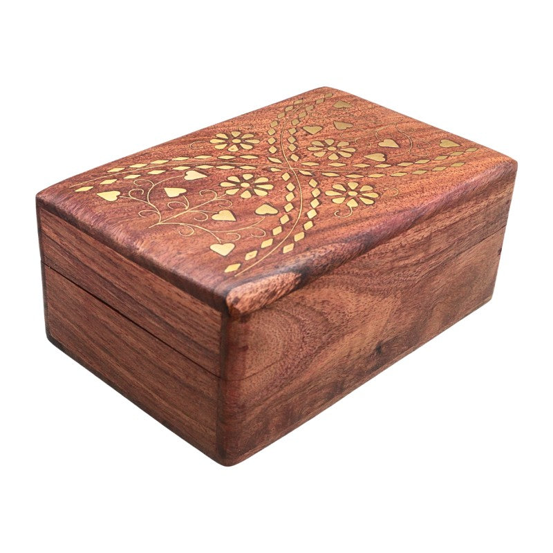 A rectangular wooden keepsake box with a hinged lid, featuring a warm reddish-brown wood grain and gold-colored floral inlay on the top surface, shown against a plain white background.