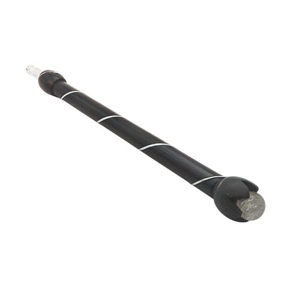 wooden wand with crystal ball end and point on white background