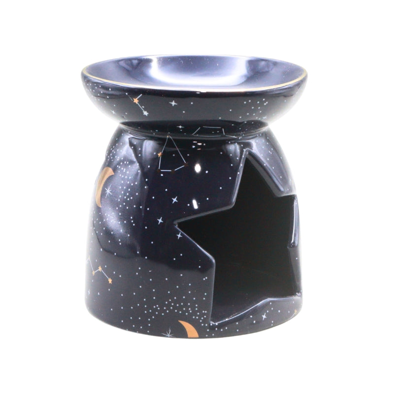 A ceramic oil burner with a star and constellation space design in black, white, and subtle gold accents, shown on a plain white background.