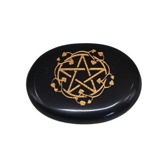 Black stone with gold pentagram design on a white background