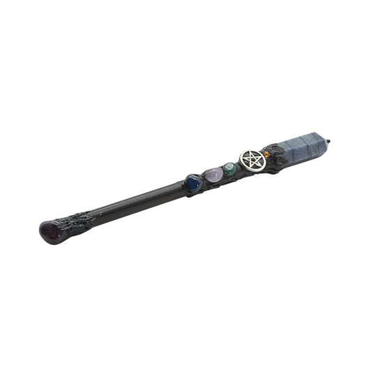 Decorative wand with mystical symbols on a white background