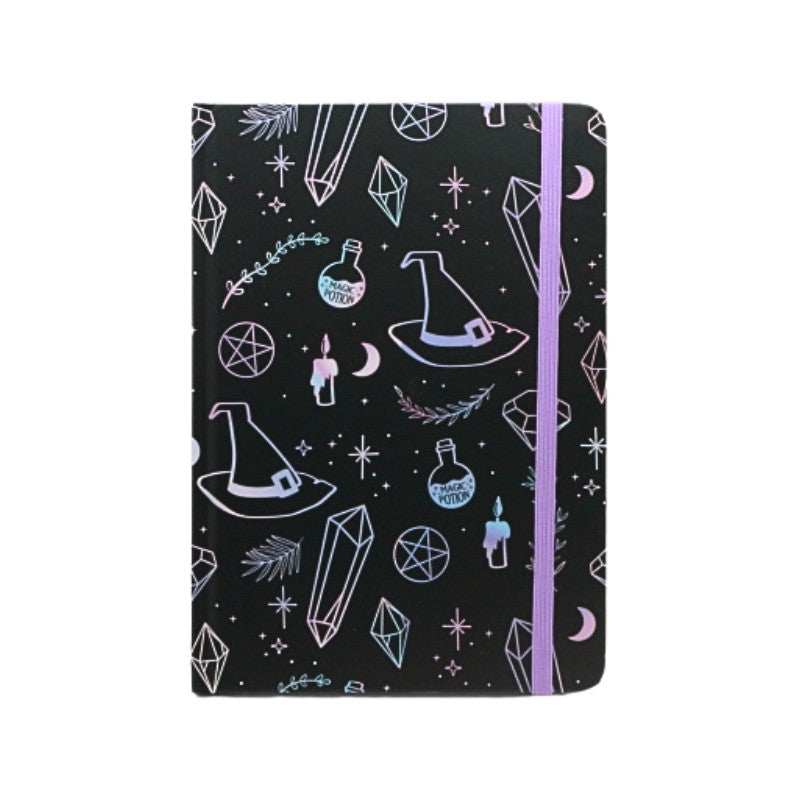 Notebook with witch hat and crystal design on a black background