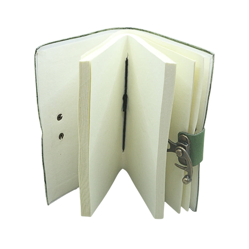 inside of a notebook with blank pages and a locking closure, on a white background