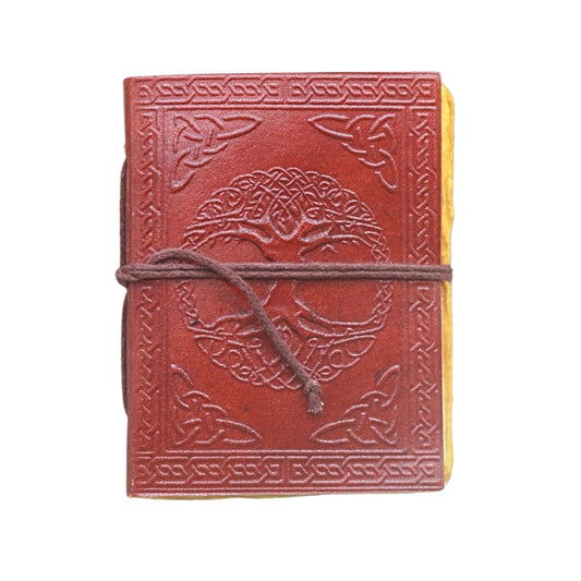 brown leather journal, embossed with image of a tree and celtic knots, with a brown tie, on a white background