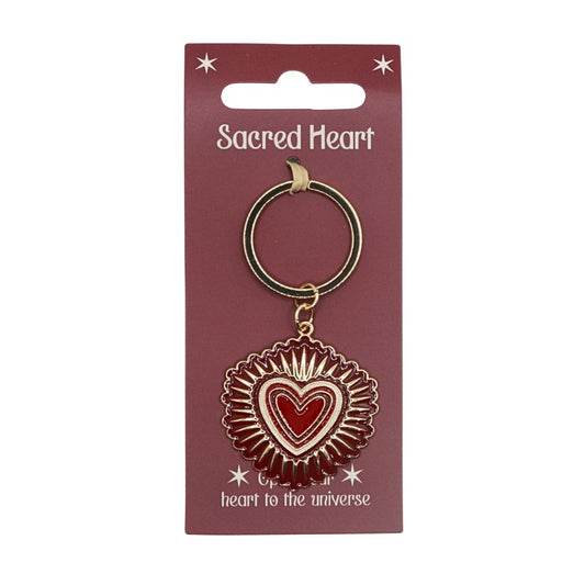 Keychain with 'Sacred Heart' design on a red card