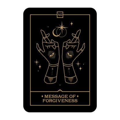 oracle card with hands and celestial symbols on a black background