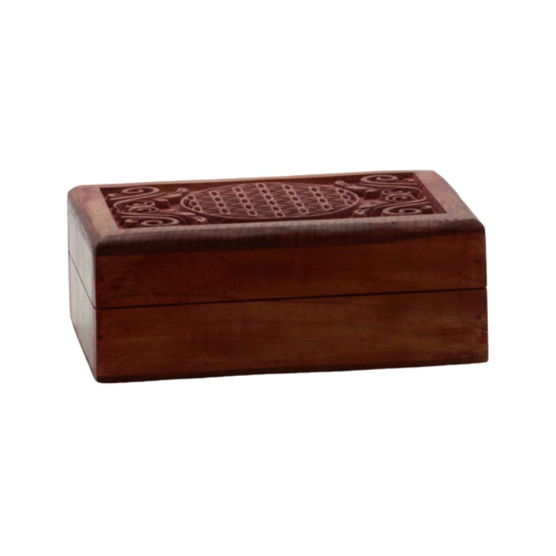 carved wooden box with flower of life design carved on top