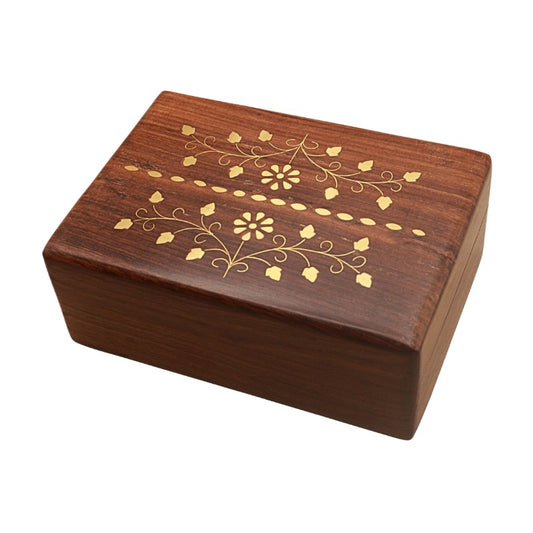 Wooden box with floral patterns on a white background