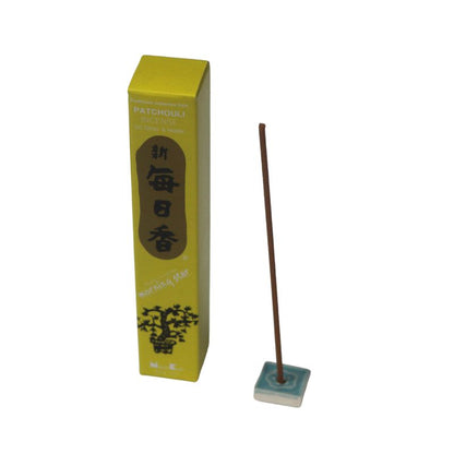  rectangle box of japanese morning star "Patchouli" incense sticks next to a tile incense holder 
